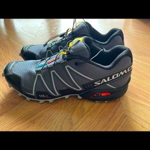 Salomon tennis shoes for men. Size 12